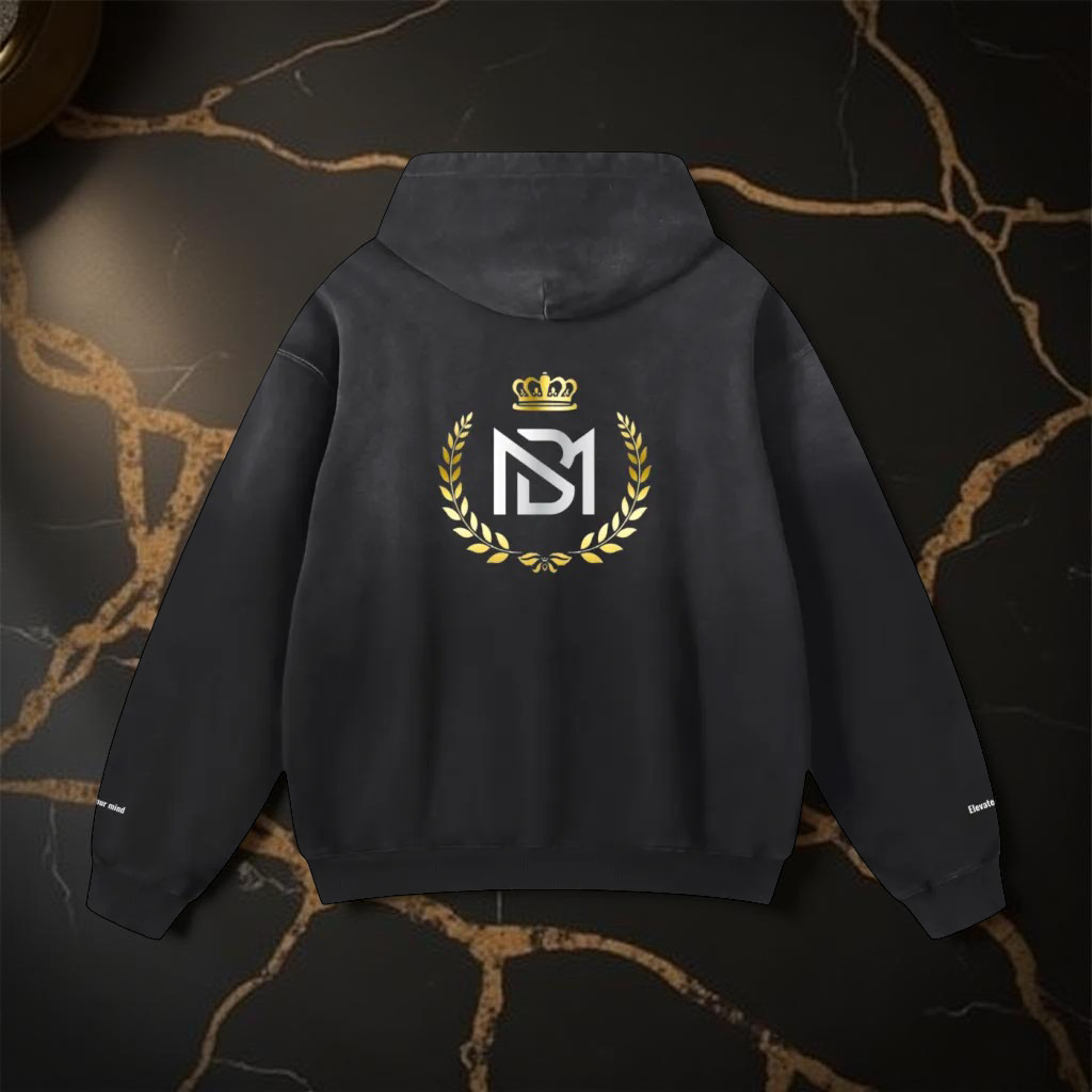 Black hoodie with a logo on the back against a dark marble background